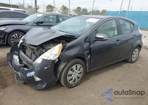 2014 Toyota Prius C One from USA, damaged, VIN JTDKDTB31E1567552